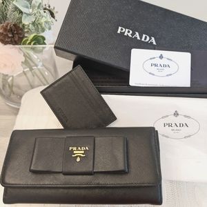 PRADA - Saffiano Bi-Fold Black Leather Bow Wallet